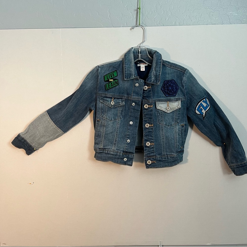 Cat and Jack Jean jacket small with “Be a hero, appliqués, on back.